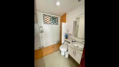 a small bathroom with a toilet and a sink at 2 Bedroom Beachfront Apartment 2P1-Al4 With Pool And WIFI in Cartagena de Indias