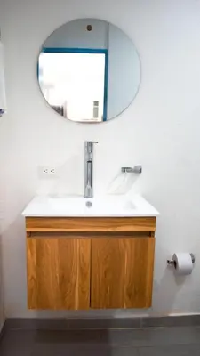 a bathroom with a sink and a mirror at Linda cabaña en Isla Tierra Bomba frente a Cartagena in Cartagena de Indias
