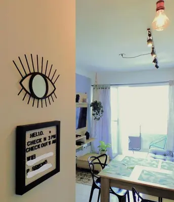 a room with a table and a dining room at Cómodo apartamento cerca al mar. in Cartagena de Indias