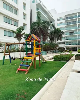 a playground in front of a large building at Cartagena Apartamento 409 Edf Morros 922 ToLuSa in Cartagena de Indias