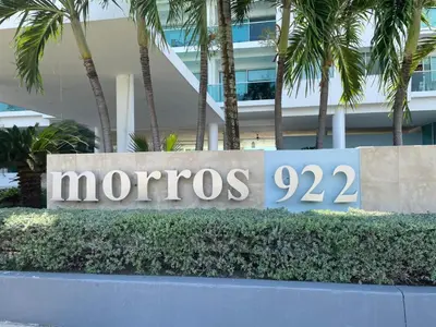 a sign for morocco in front of a building at Cartagena Apartamento 409 Edf Morros 922 ToLuSa in Cartagena de Indias
