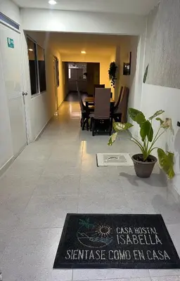 a welcome mat on the floor of a hallway at Casa Hotel Isabella in Santa Marta