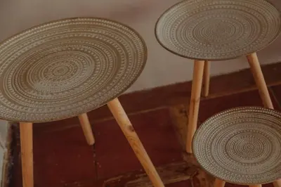 three wooden stools with woven hats on them at Isla Kalua - Private Ocean Villa in Isla Pavitos