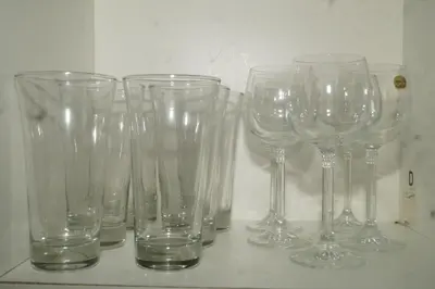 a group of empty wine glasses sitting on a counter at Apartamento el Calamar in Cartagena de Indias