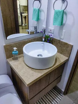 a sink in a bathroom with a large mirror at Apartamento morros con acceso directo a la playa in Cartagena de Indias
