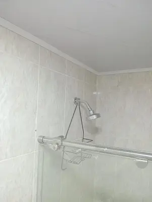 a shower in a bathroom with a shower head at Hostel HA LUXURY in Cartagena de Indias