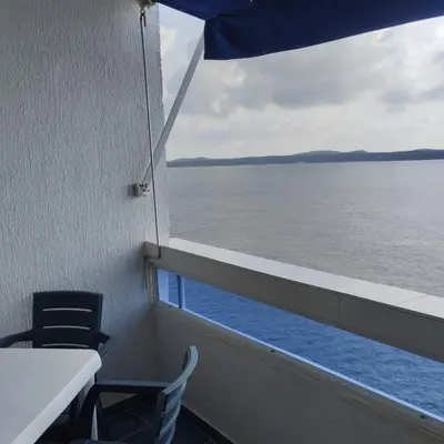 a view of the ocean from the balcony of a ship at Apartamento con hermosa vista al mar en cartagena de indias in Cartagena de Indias