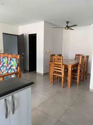 a dining room with a table and chairs at Apartamento en Coveñas cerca al mar #204 in Coveñas