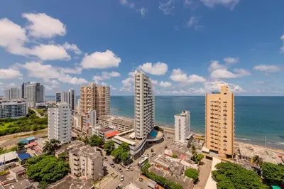 an aerial view of a city with buildings and the ocean at amor por cartagena in Cartagena de Indias