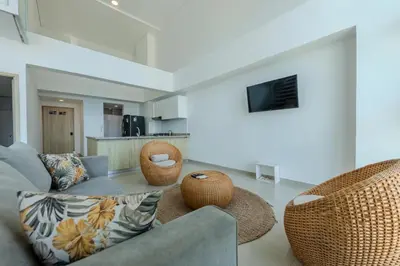 a living room with a couch and chairs at amor por cartagena in Cartagena de Indias