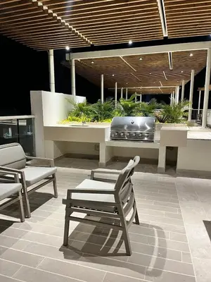 a patio with two chairs and a hot tub at DQ505 Nuevo hermoso jacuzzi priv in Cartagena de Indias