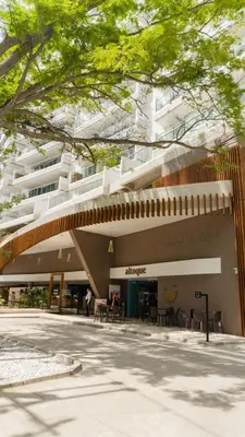 a building with tables and chairs in front of it at DQ505 Nuevo hermoso jacuzzi priv in Cartagena de Indias