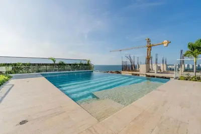 a swimming pool with a view of the ocean at MQ1003 | Jacuzzi privado · Relax en Cielo Mar in Cartagena de Indias