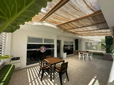 a patio with a table and chairs and a ceiling at Hotel Zuriel Boutique in Cartagena de Indias