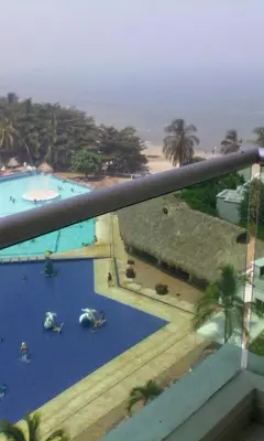 a view from the balcony of a resort with two pools at Costa Azul Suites 63 in Playa Dormida