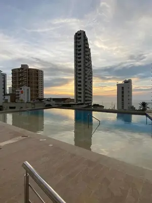 a large swimming pool on the roof of a building at Espectacular Duplex con vista al mar in Cartagena de Indias