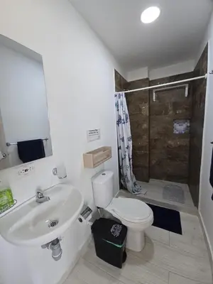 a bathroom with a sink and a toilet at Dúplex de lujo con vista al mar - San Bernardo del Viento in San Bernardo del Viento