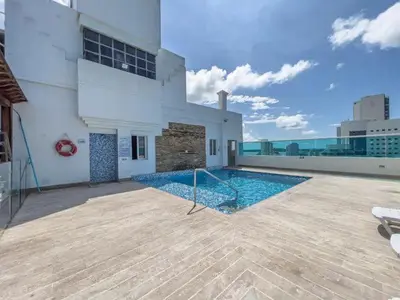 a swimming pool on the roof of a building at Cartagena beach front in Cartagena de Indias