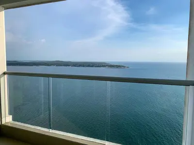 a view of the ocean from a balcony at Sea, Sand & Skyline 30th-Floor Poolside Getaway in Cartagena de Indias