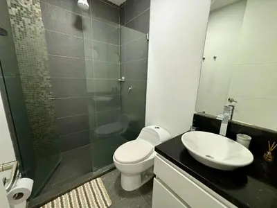 a bathroom with a toilet and a sink and a shower at Apartamento en Laguito Ed. Cristoforo 303 ICDI in Cartagena de Indias