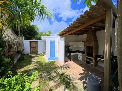 a patio of a house with a kitchen in it at CountrySide Stay Melina in San Mateo