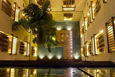 a lobby of a building with a heart on the wall at Bastión Luxury Hotel in Cartagena de Indias