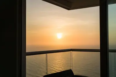a view of the ocean from a balcony at Apartamento 3404 Palmetto Beach Frente a la playa in Cartagena de Indias