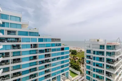an aerial view of two tall buildings next to the ocean at Espectacular apartamento en Cartagena Seaway935 - Morros in Cartagena de Indias