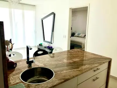 a bathroom with a sink and a mirror at MORROS EPIC Un refugio frente al mar in Cartagena de Indias