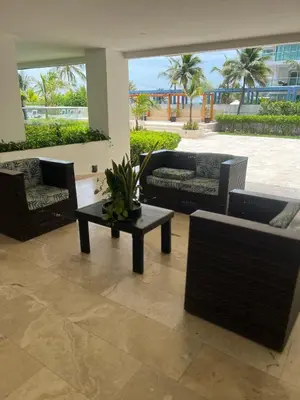 a living room with couches and a coffee table at MORROS EPIC Un refugio frente al mar in Cartagena de Indias