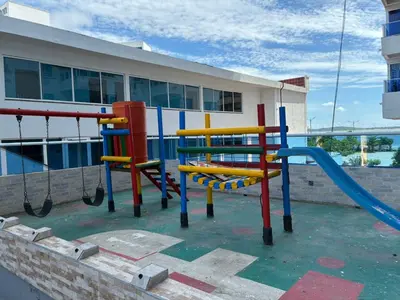 a playground in front of a building at Hermoso apartamento con vista al mar in Cartagena de Indias