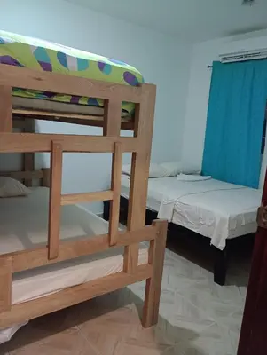 a pair of bunk beds in a room at Apartahotel Eden Coveñas in Coveñas