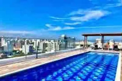 a swimming pool on the roof of a building at Amazing views in Barranquilla in Barranquilla
