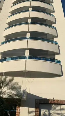 a tall white building with a lot of windows at Exquisite apartment in El Laguito Cartagena in Cartagena de Indias