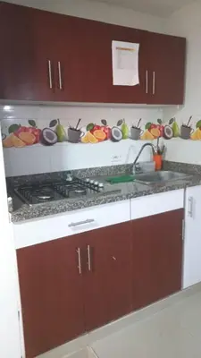 a kitchen with a stove and a counter top at 3 bedroom apartment 3CL3 in the old center in Cartagena de Indias
