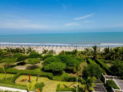 a view of the beach from the balcony of a resort at Apartamento en Morros Zoe con acceso directo al mar en Cartagena in Cartagena de Indias