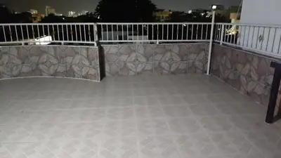a balcony with a railing and a tile floor at Apto los Almendros in Cartagena de Indias