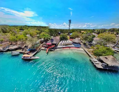 an aerial view of a resort on the water at Hotel Isla Lizamar in Isla Grande