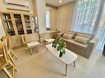 a living room with a couch and a table at Morros Zoe - Beautiful Apartment on Manzanillo Beach in Cartagena de Indias