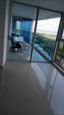 a room with a table and a bench in a building at Penthouse vista panoramica frontal al mar 450 mts2 in Cartagena de Indias