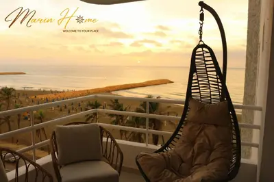 a swing on a balcony with a view of the ocean at 2BR Oceanfront Apartment - Direct Beach Access - Modern and Spacious - 6th Floor in Cartagena de Indias