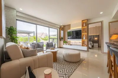a living room with a couch and a table at Lujoso Apartamento Con Salida Directa A La Playa Edificio Morros Eco in Cartagena de Indias