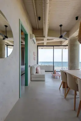 a living room with a couch and a table at Bondo Estudio in Cartagena de Indias