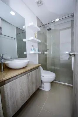 a bathroom with a sink and a toilet and a shower at APARTAMENTO OCEAN DRIVE 410 CARTAGENA in Cartagena de Indias