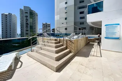 a balcony with stairs and a pool in a building at Apartamento 2 Dormitorios Laguito. Vista Mar in Cartagena de Indias