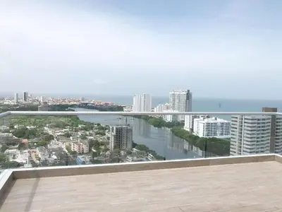 a view of the city from the balcony of a building at Apartamento vacacional cerca del mar in Cartagena de Indias