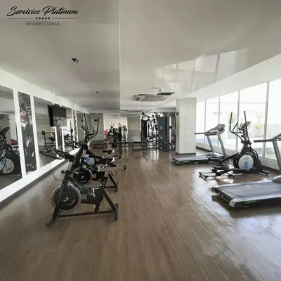 a gym with several treadmills and exercise bikes at 12 personas en Morros apto familiar frente al mar Cartagena 4 hab playa piscina in Cartagena de Indias