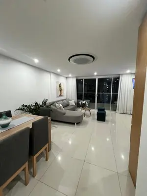 a living room with a couch and a table at Cartagena Seaview Elegance in Cartagena de Indias