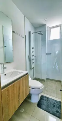 a bathroom with a sink and a toilet and a shower at Cartagena Seaview Elegance in Cartagena de Indias