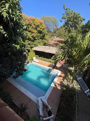 an overhead view of a swimming pool in a yard at Hostal Los Arhuacos in Santa Marta